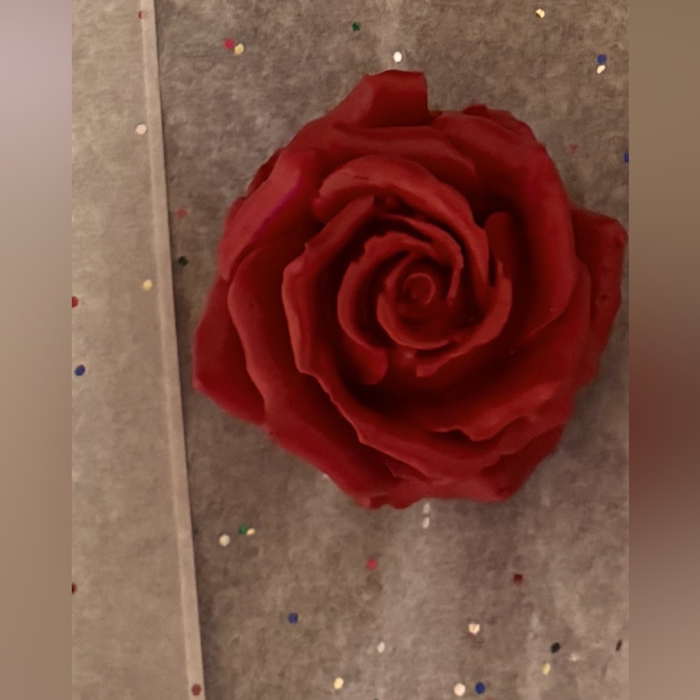 Hand poured ceramic rose 3in diameter break able by 3 1/2 inches.